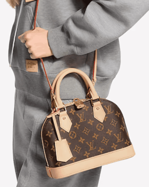 BOLSO ALMA BB LOUIS VUITTON MONOGRAM EN LONA REVESTIDA CON CANDADO DORADO